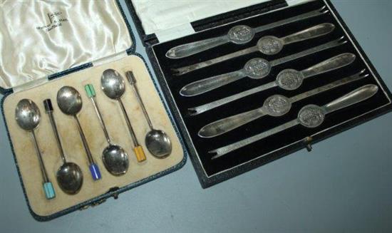 Cased set of silver lobster picks and similar silver ands enamel coffee spoons